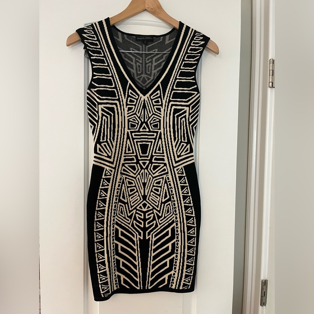 black and beige dress, size medium, Runs small, excellent condition